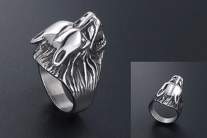 Macro detail of a silver howling wolf head ring made from durable stainless steel