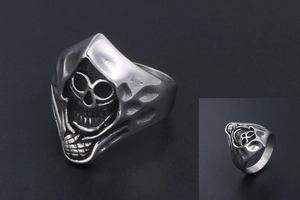 Detailed close-up showing the intricate gothic reaper skull design on a titanium steel ring