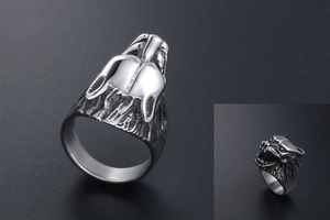 Detailed macro of vintage wolf head ring with antique finish and steel engraving