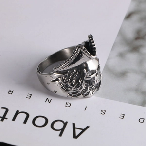 Close-up of vintage pirate skull ring in stainless steel with aged finish details