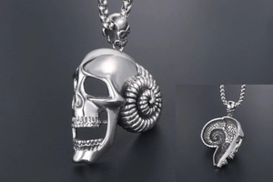 Detailed macro view of vintage ram horn skull pendant with stainless steel back structure