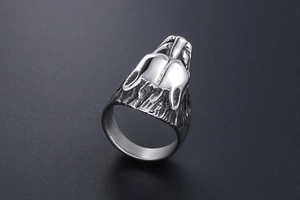 Macro shot of retro stainless steel wolf head ring with detailed vintage black finish