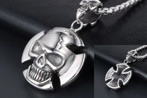 Macro shot of punk skull pendant showing polished finish and detailed back texture