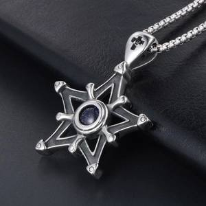 Pendentif hexagramme en acier avec grès bleu et détail de croix évidée