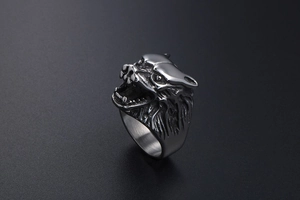 Detailed view of punk style wolf head ring with retro metal texture and fine engraving