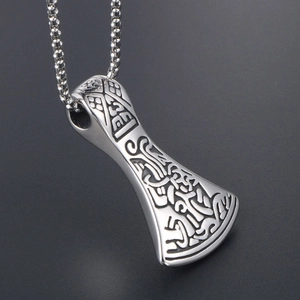 Viking style stainless steel axe pendant with intricate engraving and beaded chain
