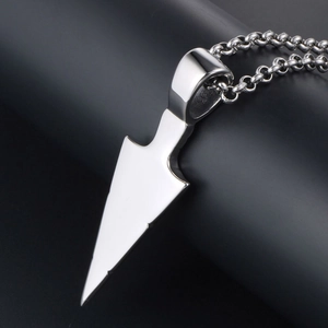 Polished silver triangle arrow pendant necklace in titanium steel on a black background