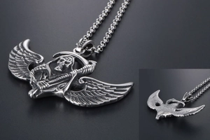 Macro detail of gothic winged grim reaper pendant in vintage stainless steel finish
