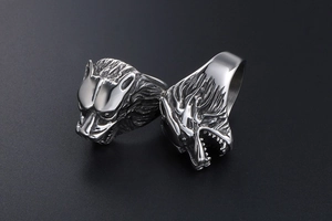 Detailed view showing the textured wolf head design on a silver vintage titanium steel ring