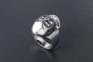 Detailed view of punk style stainless steel ring with industrial geometric engraving