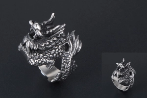 Detailed view of the intricately carved dragon scales on the vintage silver ring for men