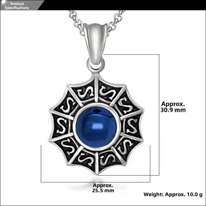 Vue détaillée du pendentif rond en acier avec zircon bleu et dimensions 30,9x25,5 mm