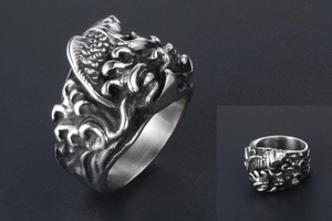 Detailed relief of vintage koi fish and wave patterns on a titanium steel band ring