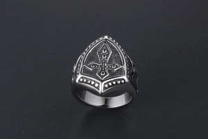 Detailed top view of retro titanium steel ring with embossed cross shield design