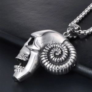 Gothic skull pendant with ammonite spiral design on a box chain for men