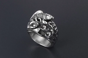 Macro detail of retro fish scale pattern and waves on titanium steel wide band ring