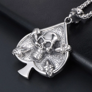 Vintage punk spade skull pendant necklace with textured finish on a wheat chain link
