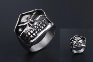 Detailed view of punk skull ring in vintage titanium steel with black oxidized finish