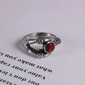 Gothic silver stainless steel claw ring with a round red gemstone for men and women