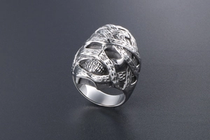 Detailed view of punk mummy skull ring with vintage distressed stainless steel finish