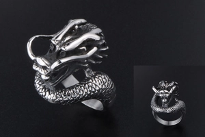 Detailed view of vintage titanium steel dragon ring with intricate scale texture