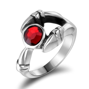 Gothic vintage stainless steel ring featuring a large round red zircon gemstone center