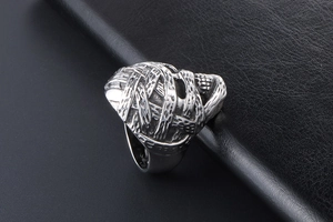 Macro view of punk style mummy skull ring featuring retro distressed bandage texture