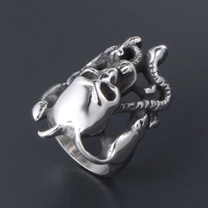 Bague vintage tête de mort et serpent en relief en acier au style punk gothique