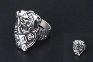 Detailed relief of Grim Reaper with scythe on a vintage silver punk style skull ring