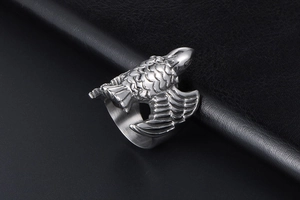 Macro view of flying eagle titanium steel ring with detailed silver feather texture
