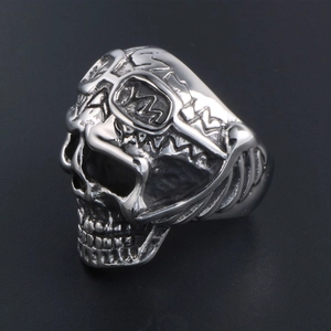 Vintage punk skull ring in silver stainless steel with detailed gothic totem engraving