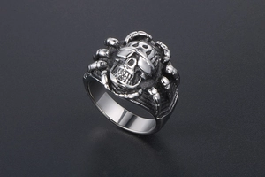 Detailed view of punk skull ring with sunglasses made of vintage titanium steel
