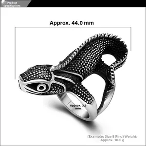 Detailed macro view showing a 44mm vintage lizard ring with scale textures and dimensions