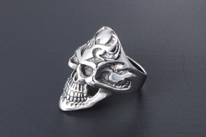 Macro view of a bold silver gothic skull ring made of durable stainless steel