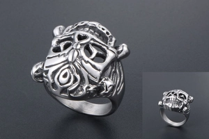 Close-up of gothic stainless steel lion ring with intricate punk style monster carvings