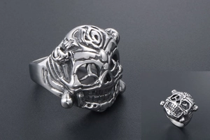 Detailed view of gothic lion head ring with vintage finish and intricate skull textures