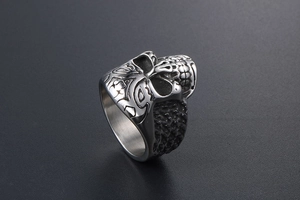 Detailed macro shot of vintage skull ring in distressed stainless steel with rock style