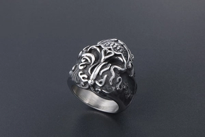 Detailed relief of skull and cloud pattern on vintage gothic steel band ring