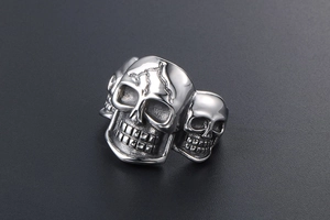 Macro shot of vintage skull ring in stainless steel with punk lightning bolt details