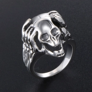 Gothic punk skull ring for men in polished stainless steel with skeleton hand details