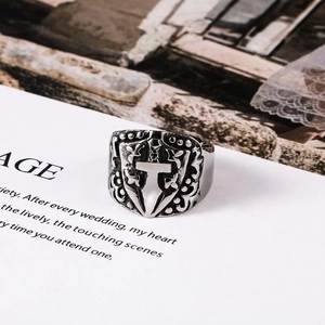 Gothic punk style stainless steel signet ring with vintage sword crest and floral relief