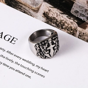 Gothic punk sword and cross shield ring in vintage titanium steel, 45-degree angle view
