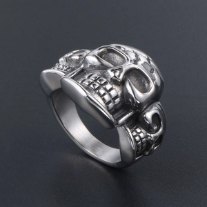 Vintage punk men's stainless steel ring featuring three 3D silver skull heads