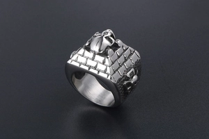 Detail of gothic stainless steel ring with pyramid beetle and skull engraving