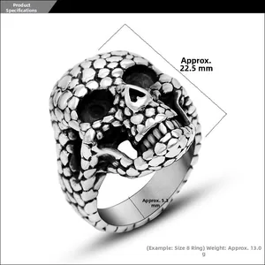 Macro shot of punk style skull ring with dimensions and technical specifications
