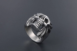 Macro view of vintage gothic skull ring with detailed silver stainless steel engraving