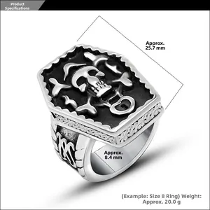 Macro detail of men's pirate skull shield ring with gothic textures and measurements