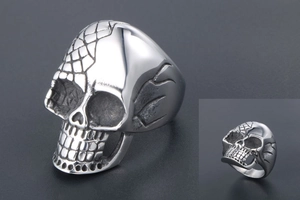 Detailed view of punk skull ring featuring realistic bone structure and polished finish