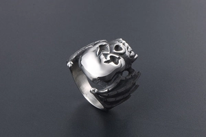 Detailed view of punk vintage bat skull ring in matte silver stainless steel finish