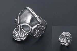 Macro detail of retro skull ring in stainless steel with vintage distressed finish